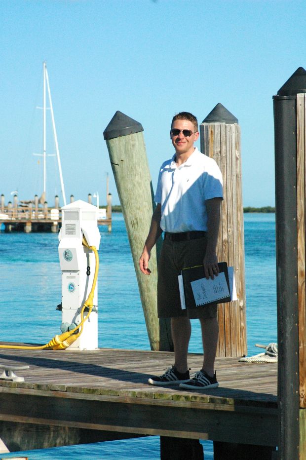 My handsome captain heading over to customs and immigration with all our stuffs (and dollars :)