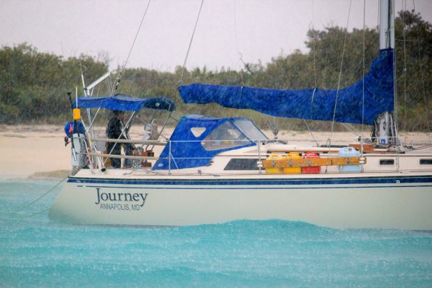 Here's the captain, still in his wetsuit, gunnin' the engine to get our anchor up!