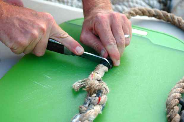 Cutting off the old splice.