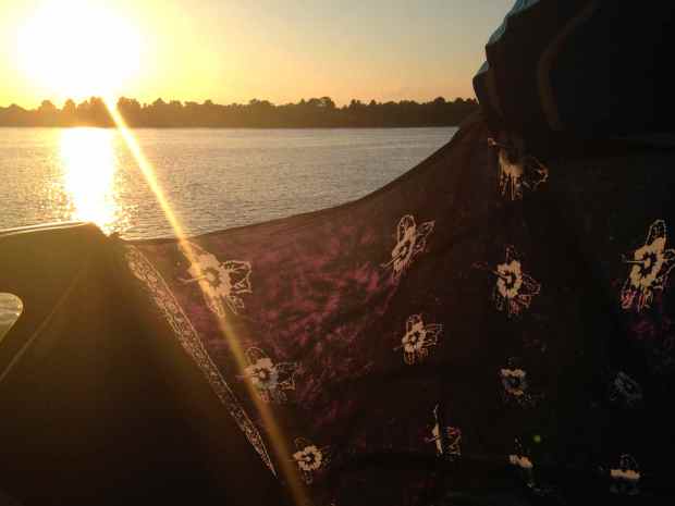 A sarong to block the sun.  I stole this trick from Kimmy!  Butler Island, SC - June 2014