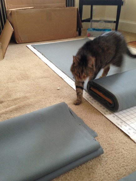 Cutting, and cutting, and cutting. With a helper of course!