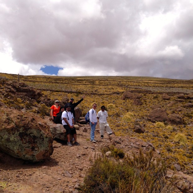 The crew, climbing in  the mountains.